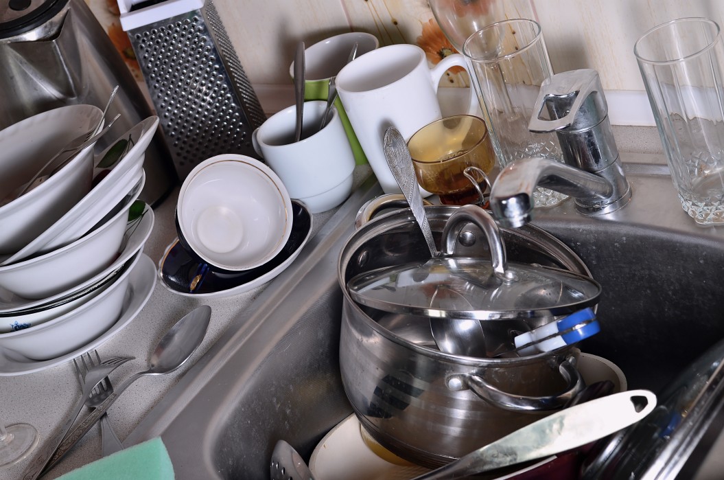 Dirty Pans and Dishes in Sink