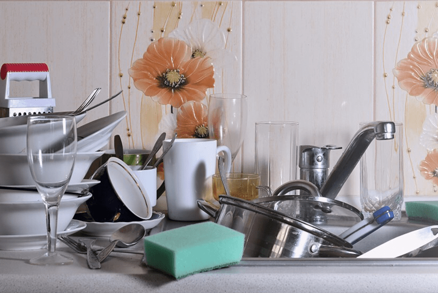 cleaning a messy kitchen